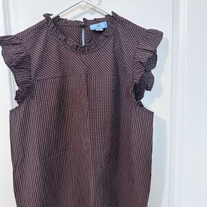 CeCe, large brown and black checked blouse.